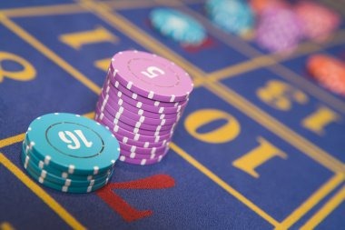 Live roulette table with professional dealers and betting interface